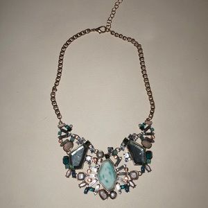 Statement Necklace with emerald colored details.